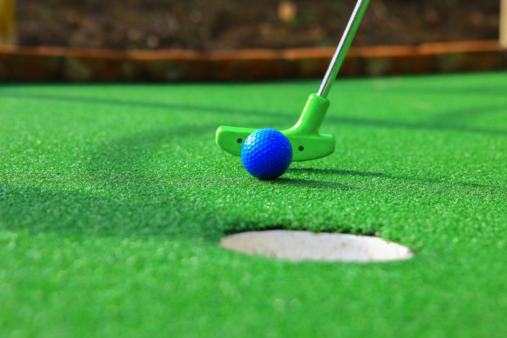 A,Club,Prepares,To,Hit,A,Ball,During,A,Mini
